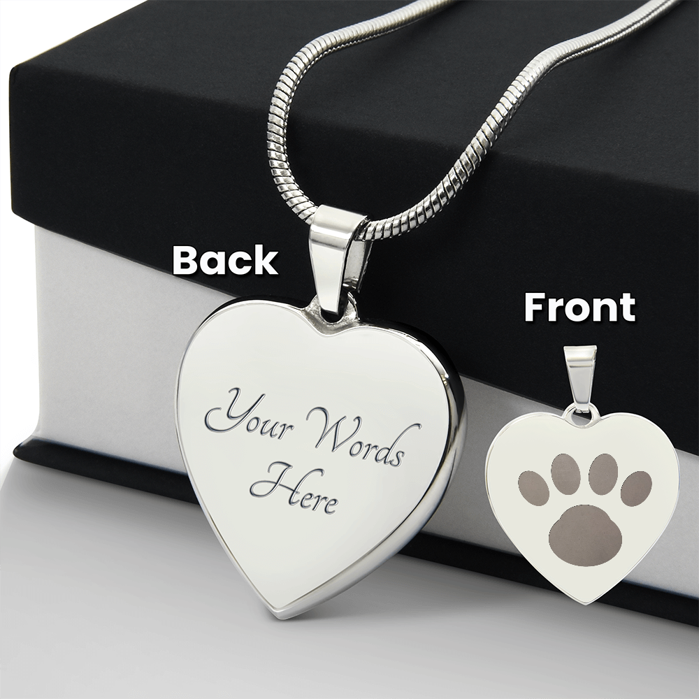 Back of the polished steel heart pendant, showing the engraved area